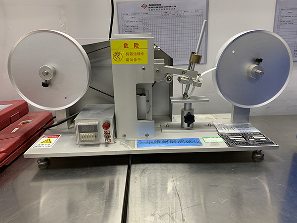Paper bag abrasion tester